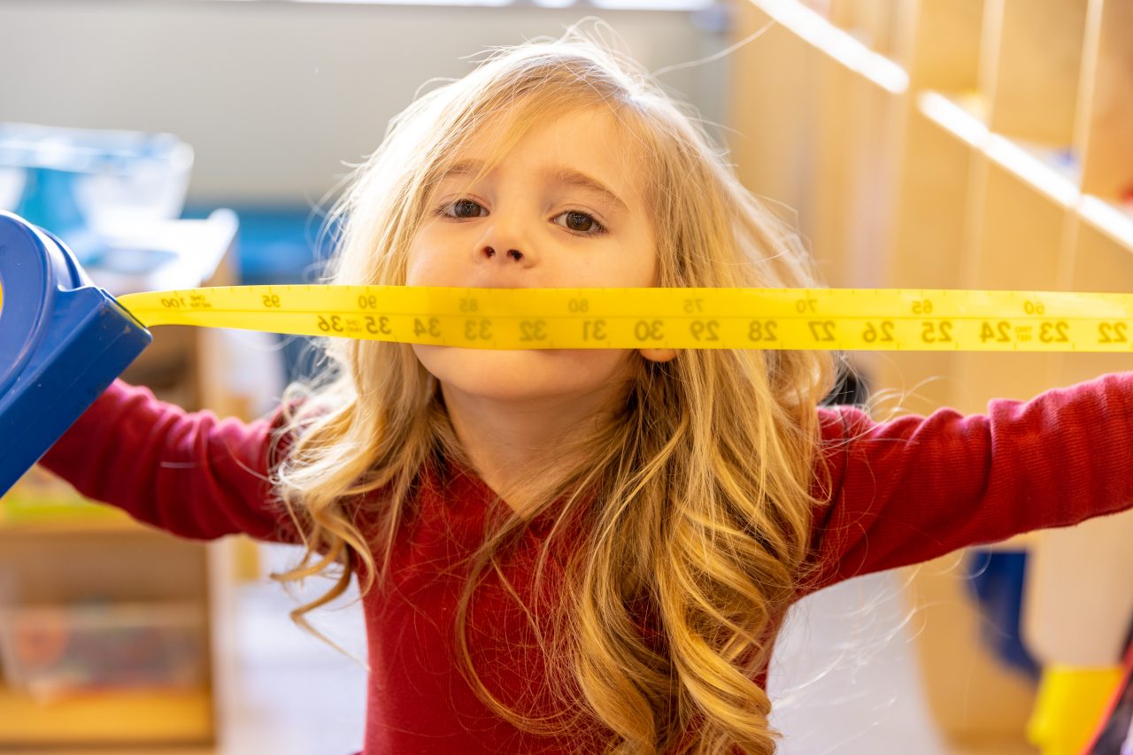 Girl with measuring tape