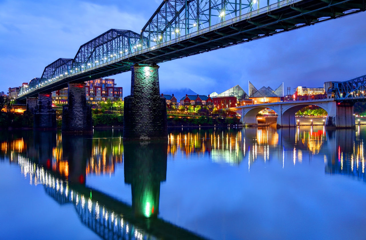 Chattanooga downtown skyline under the Walnut Street Bridge at night. The Historic Walnut Street Bridge, which is now the world's longest pedestrian bridge. The Bridge connects downtown with the North Shore. Chattanooga is the fourth-largest city in the U.S. state of Tennessee, in the seat of Hamilton County.