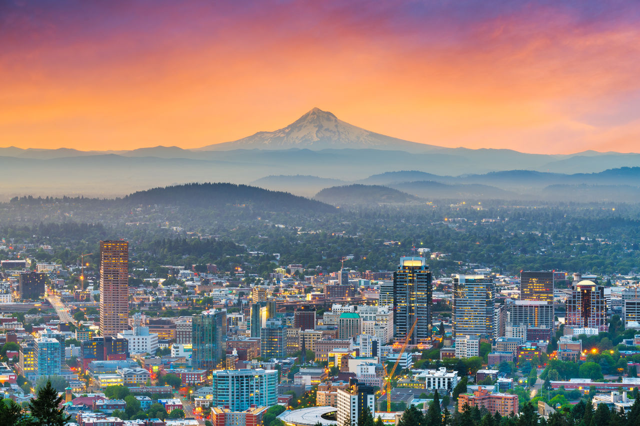 Image of the Portland, Oregon downtown skyline with Mt. Hood at dawn.
